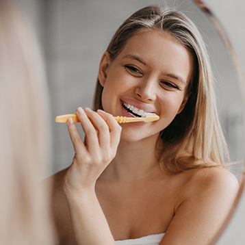 a closeup of a patient brushing their teeth